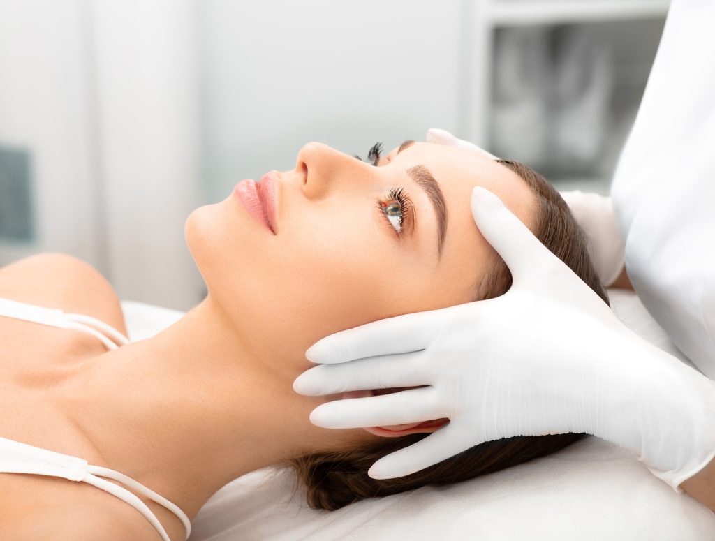Beautiful woman, with smooth, shiny skin and a clean face, after peeling and skin rejuvenation