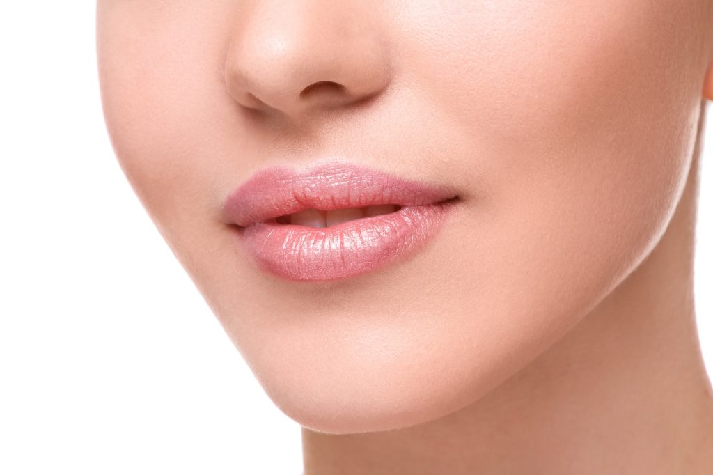 Close up of beautiful pink female lips